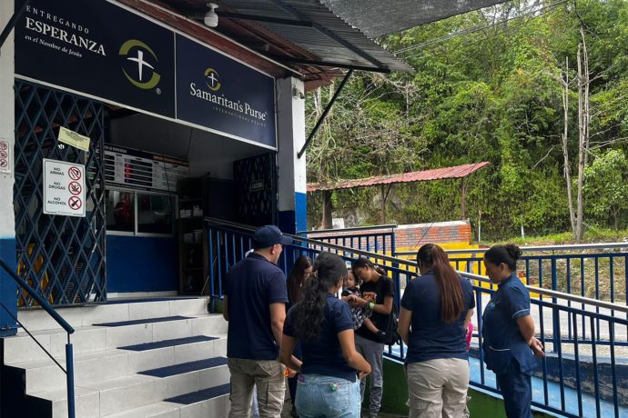 Samaritan's Purse staff gathered around the family before they departed for Venezuela to return home. We helped and supported them each step of the journey.