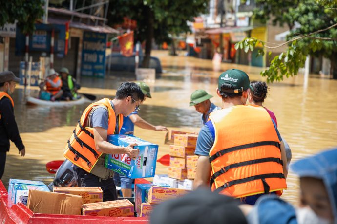 Samaritan's Purse teams use boats to carry supplies to families still stranded in their homes. 