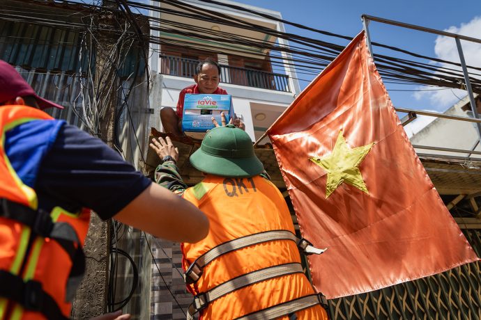 With floodwaters still covering the city streets, Samaritan's Purse had to distribute some aid to people on the rooftops of their homes. 