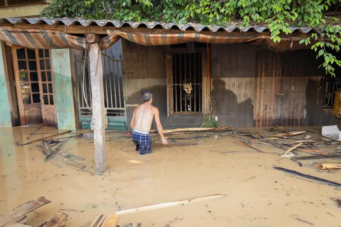 Streets and homes are still flooded in northern Vietnam after Typhoon Matmo. 