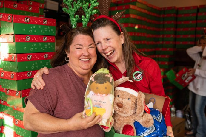 Marika and Scotta with shoebox items