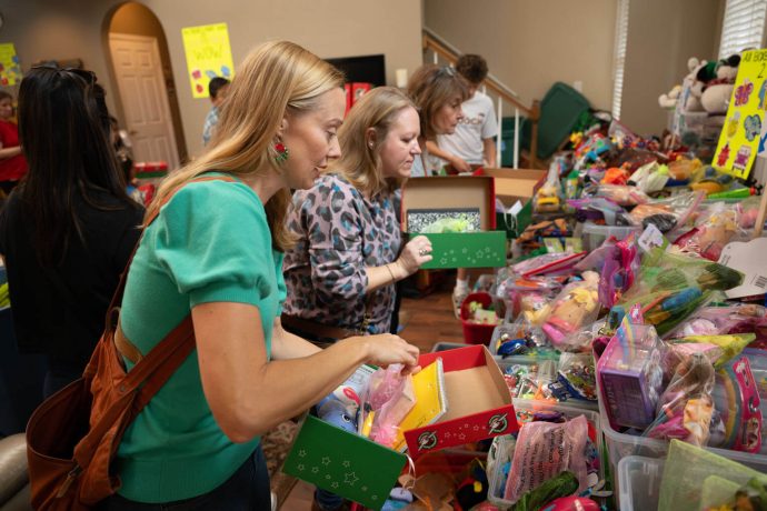 Missy fills a shoebox