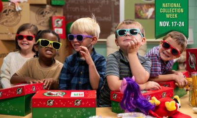 Children in sunglasses with OCC shoeboxes