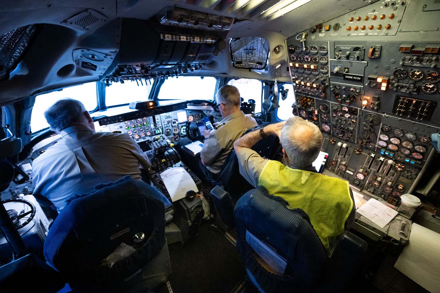 Inside the DC-8 cockpit, the crew prepares for departure on one of hundreds of missions.