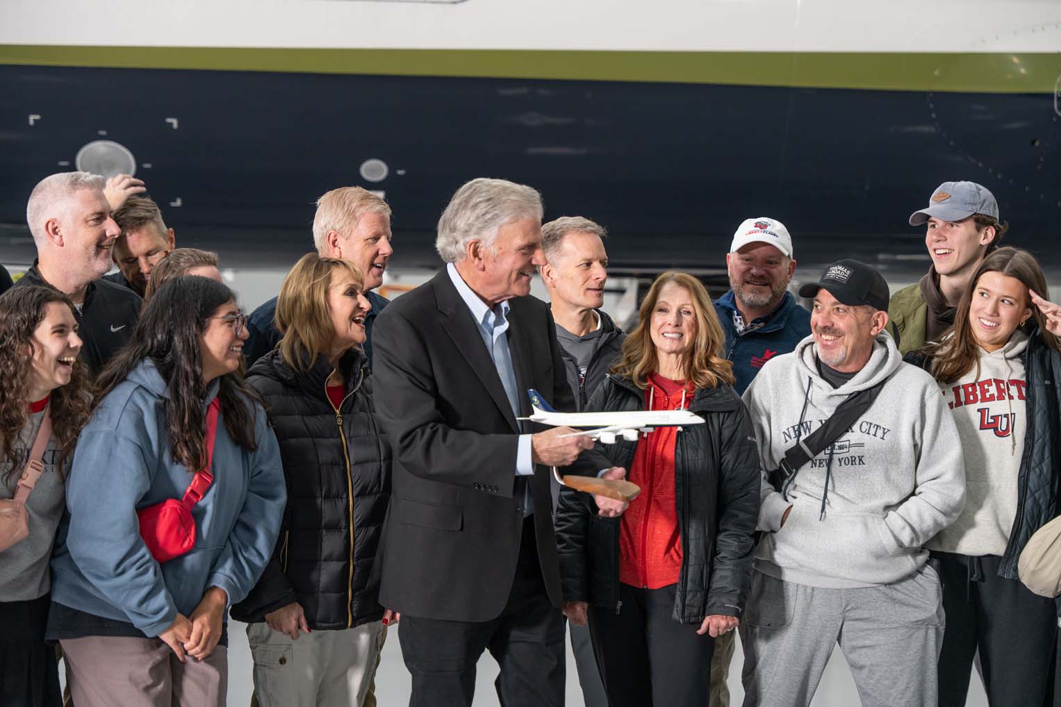 Samaritan’s Purse and Liberty University leaders celebrate the final mission of the DC-8 alongside students and team members. The historic aircraft—retired after a decade of humanitarian service—will be donated to Liberty University to support its nationally recognized School of Aeronautics.