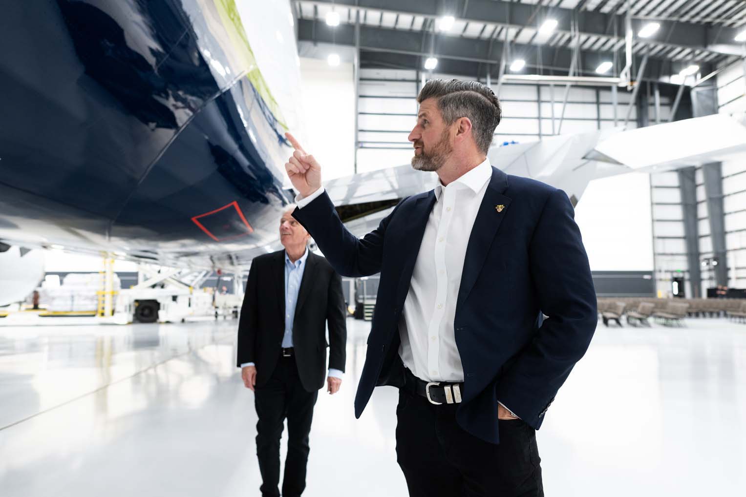 Samaritan's Purse COO Edward Graham, with father Franklin Graham, walks around the 767, the aircraft to carry on the work of carrying relief around the world in Jesus' Name.