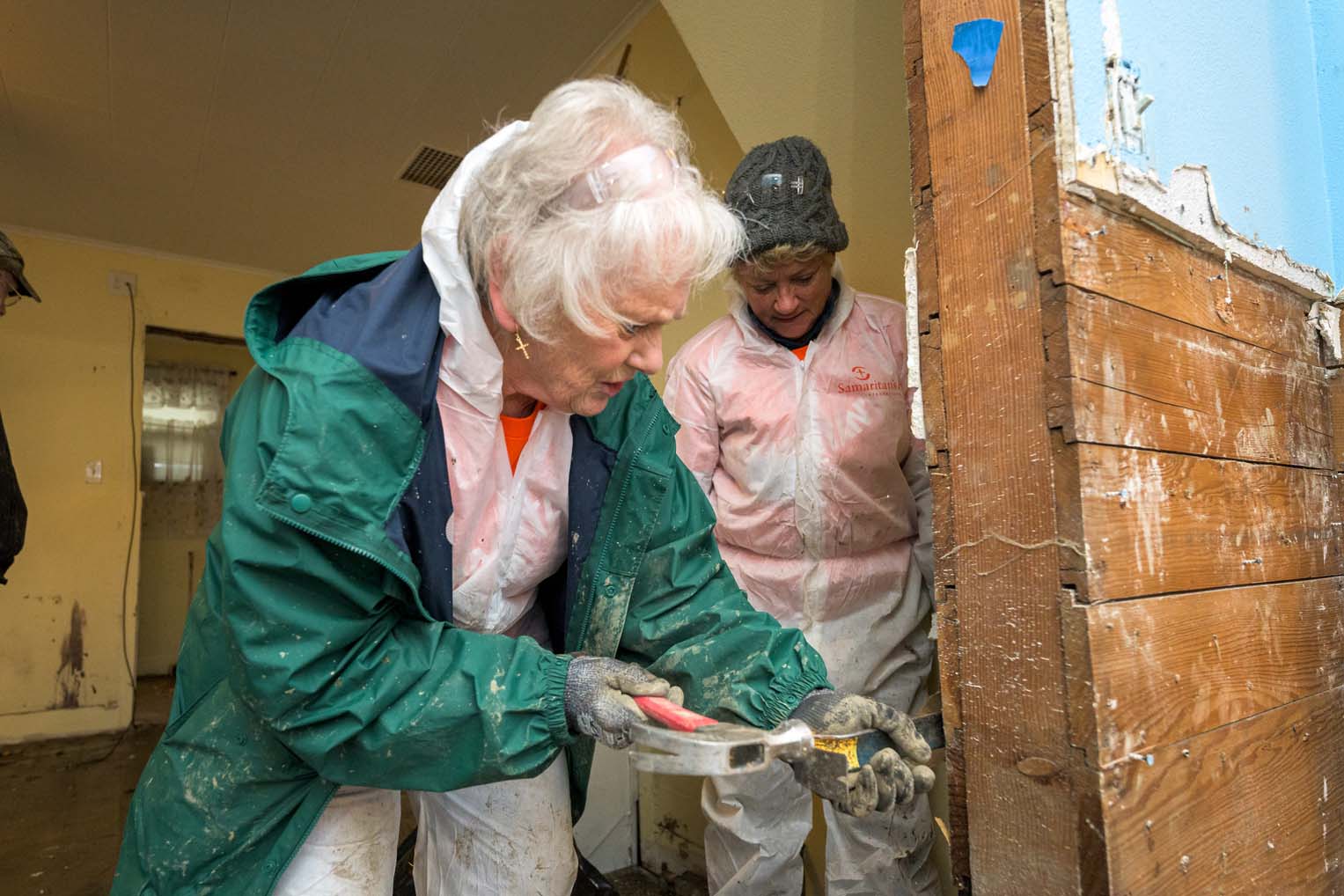 Working room by room, they helped clear what the waters had destroyed