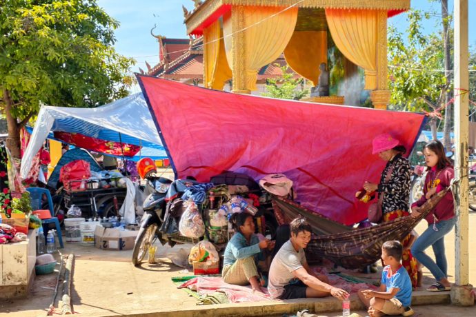 Families line streets, fill empty buildings, and search for adequate shelter as entire communities are forced away from their homes following violent conflict between Cambodia and Thailand.