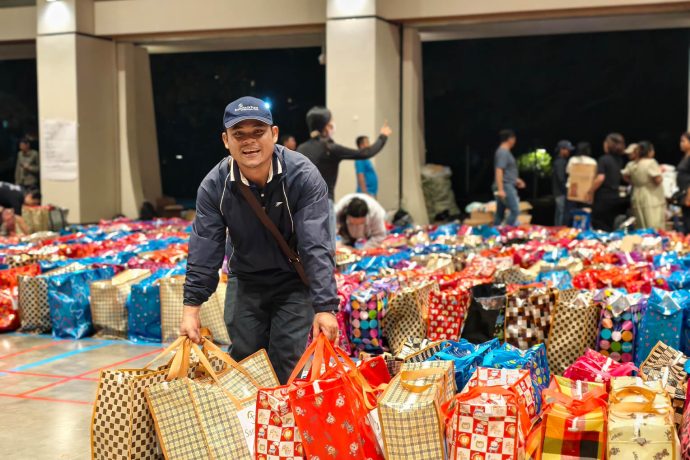 Samaritan's Purse staff pack supply kits at a local warehouse before delivering them to families in need across northwestern Cambodia.