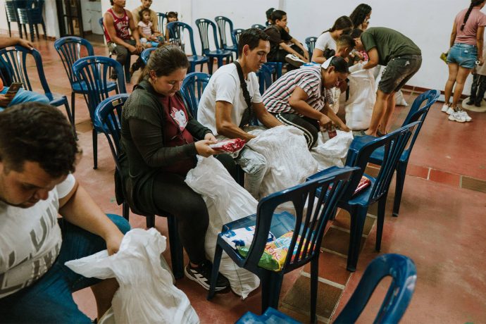 Relief washes over each family as they look through their bag of food provided by Samaritan's Purse. For the first time in months, maybe even years, these families don't have to worry about where their next meal will come from.