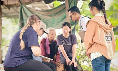 Samaritan's Purse staff pray with blind woman in Cambodia