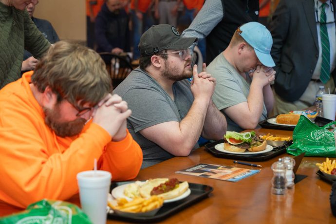 Shane and friends praying