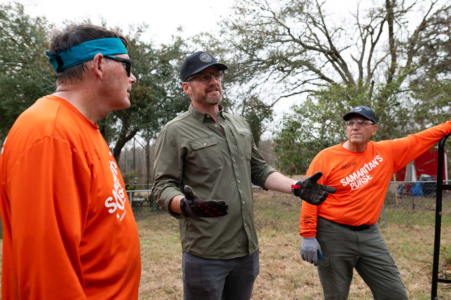 Graham encouraged volunteers and served alongside them at Monroe homes.