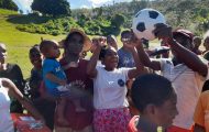 Families rejoice over a soccer ball found in a shoebox gift