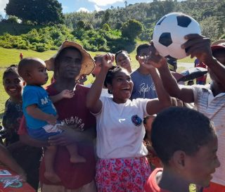 Families rejoice over a soccer ball found in a shoebox gift