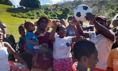 Families rejoice over a soccer ball found in a shoebox gift