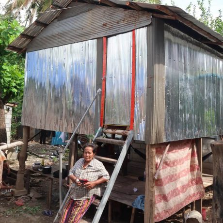 Long in front of new home