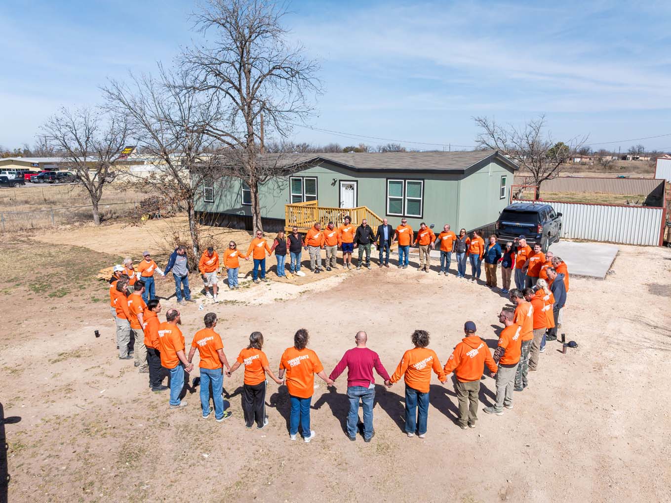 Staff and volunteers gathered to pray over their home and the region still recovering from the flood.