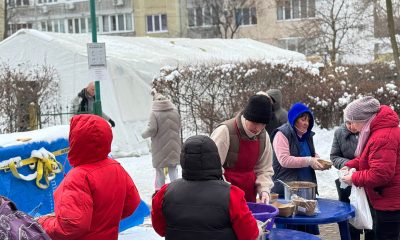 Food distribution outside tent in Kyiv
