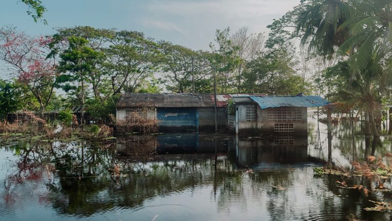 Homes, businesses, and farmland alike were consumed by floods in northern Colombia, forcing thousands of families to flee at a moment's notice.