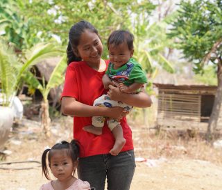 Oeurn with her two children