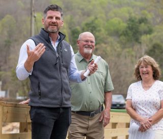 Samaritan's Purse COO Edward Graham celebrated with a western North Carolina community whose bridge was rebuilt with the help of Samaritan's Purse.