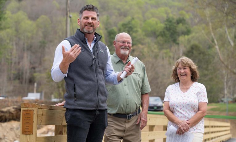Samaritan's Purse COO Edward Graham celebrated with a western North Carolina community whose bridge was rebuilt with the help of Samaritan's Purse.