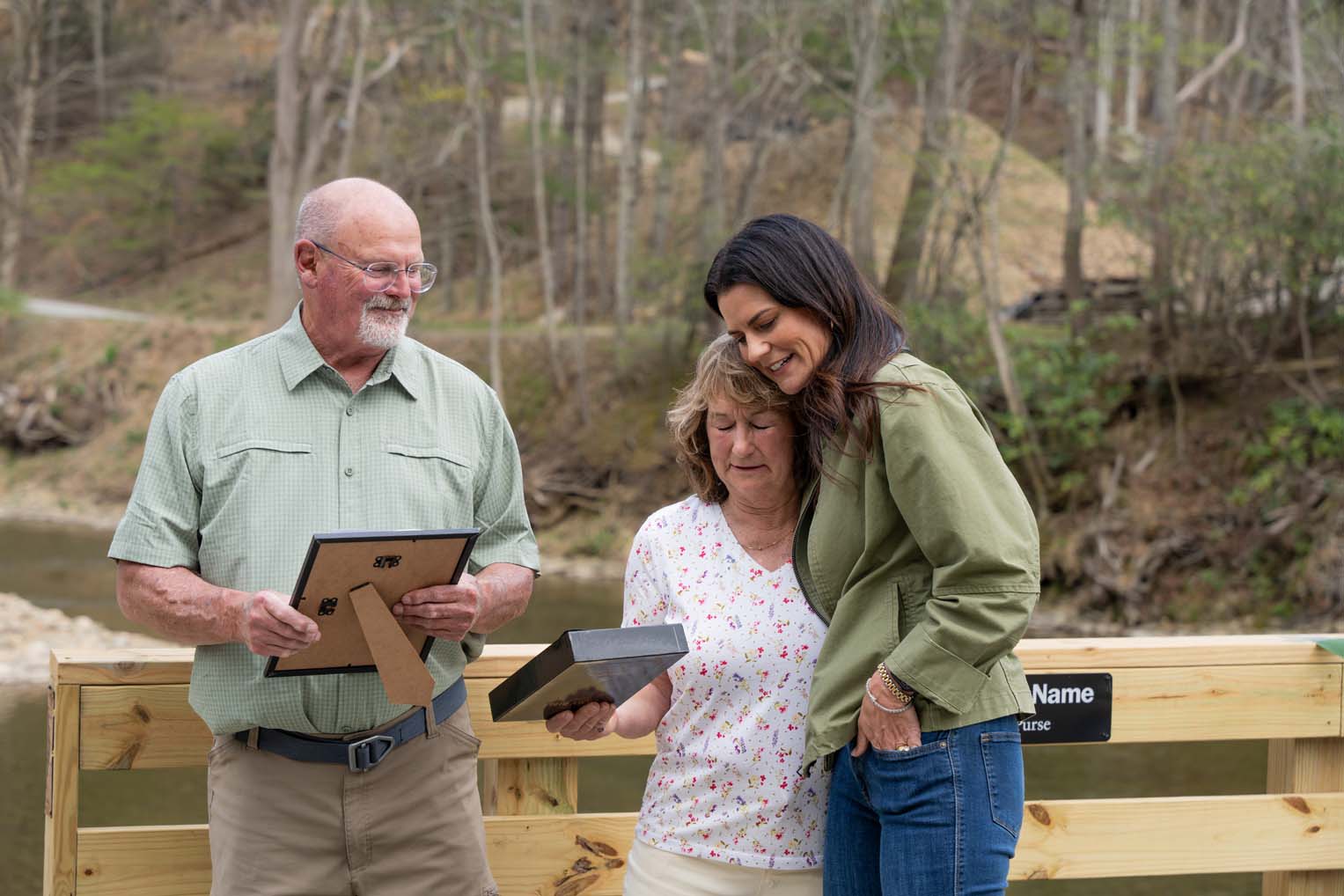 Cissie Graham Lynch presented the family with a special Billy Graham Training Center Bible.