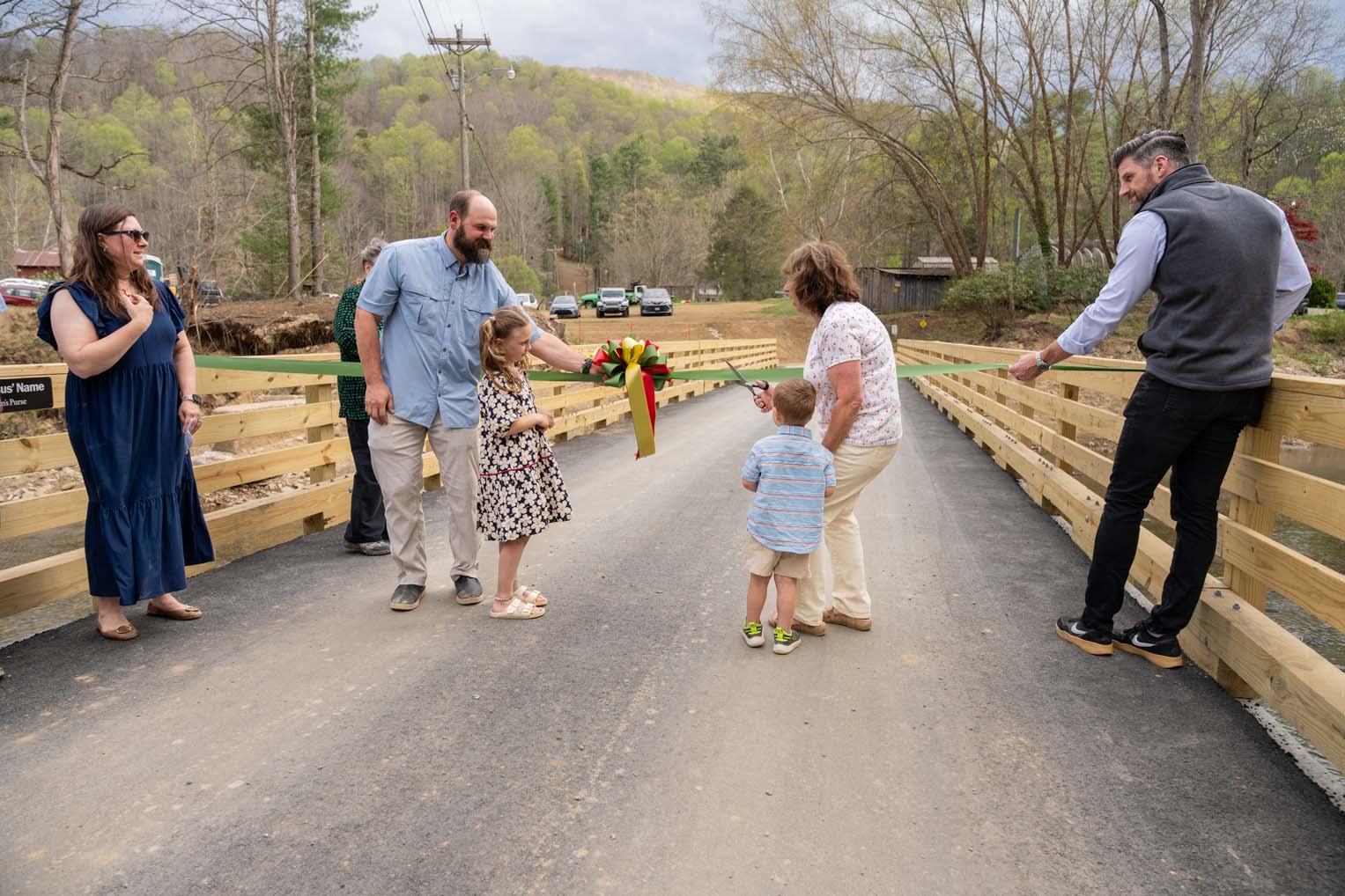 Graham helps cut the ribbon on this momentous occasion.