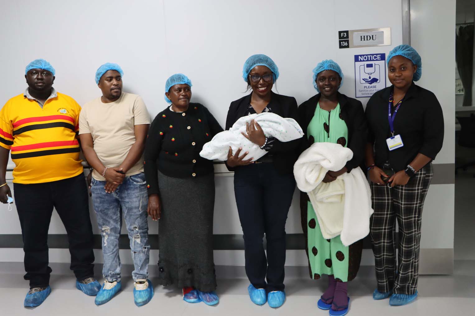 The Mwauras' extended family joined them at the hospital.