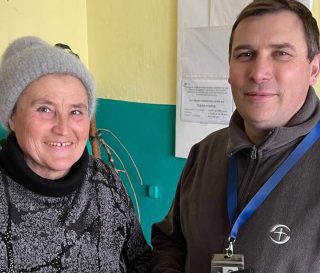 Oksana and mobile medical unit staffer