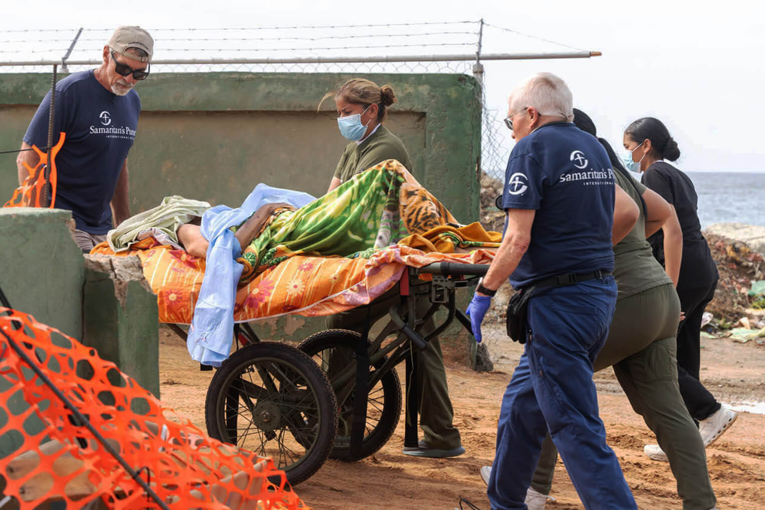 Our teams are treating patients at our Emergency Field Hospital as the region's medical system struggles to stay operational.