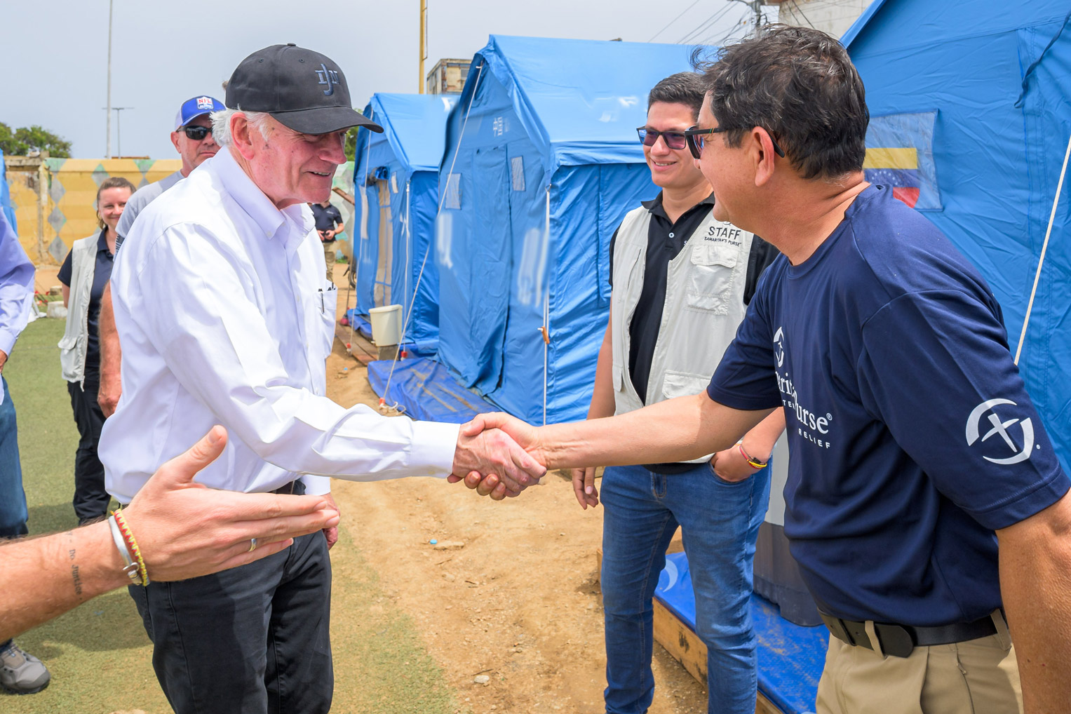 Pastor César Mermejo greets Franklin Graham in Venezuela.