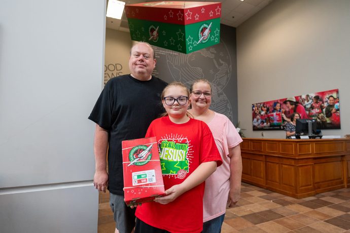 Abigail Porter with her parents Micah and Laurie