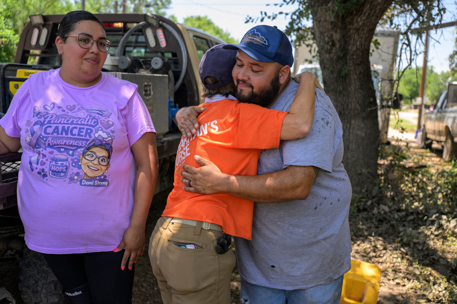 Volunteers helped Joseph and Jacqueline Ayala clean out their newly purchased home, flooded by the Guadalupe River just days before they were scheduled to move in.