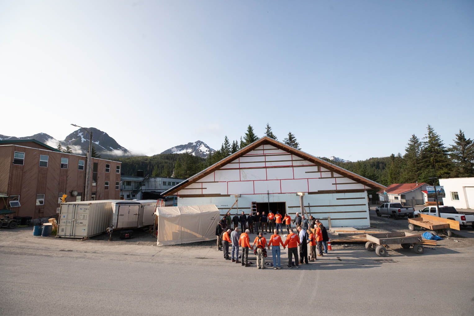 Each day on the worksite begins with prayer.