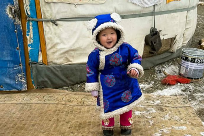 Bayarchimeg in front of her ger in Mongolia
