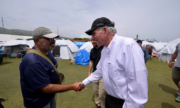 Franklin Graham meets with Pastor Manuel at a camp for earthquake survivors