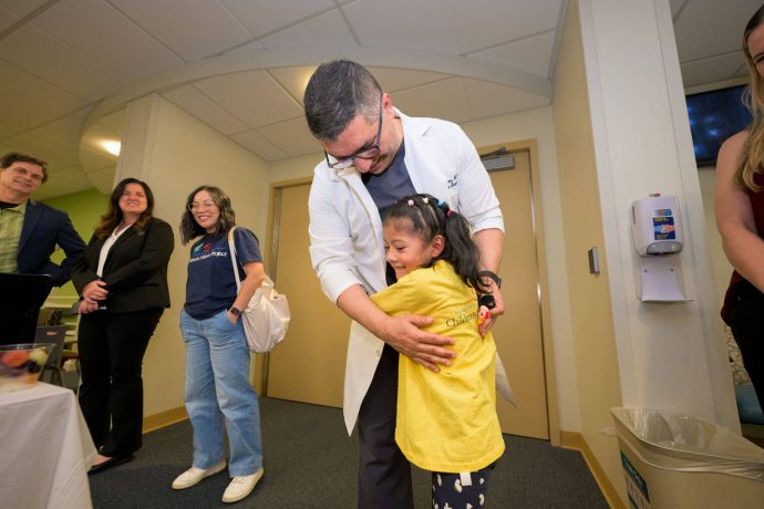 Dara hugs her surgeon, Dr. Nasirov