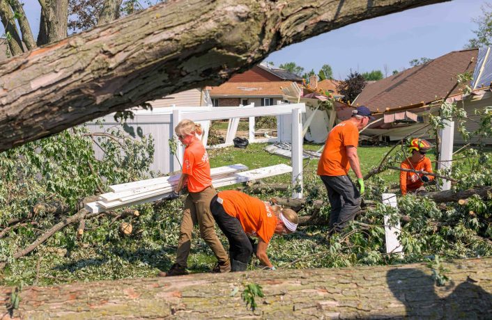 Volunteers clean up debris