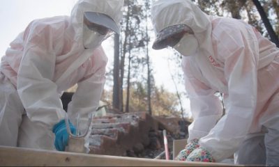 Samaritan’s Purse volunteers sifting through the ashes of a house burned by wildfires in Colorado.