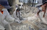 Volunteers with Samaritan's Purse sift through the ashes of a burned down home in Spokane, Washington, in September 2023. As wildfires rage in the same region again now, Samaritan's Purse will send out volunteer teams into the community in Jesus' Name once the fires are contained.