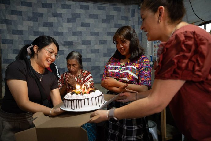 Angelita is presented with a birthday cake