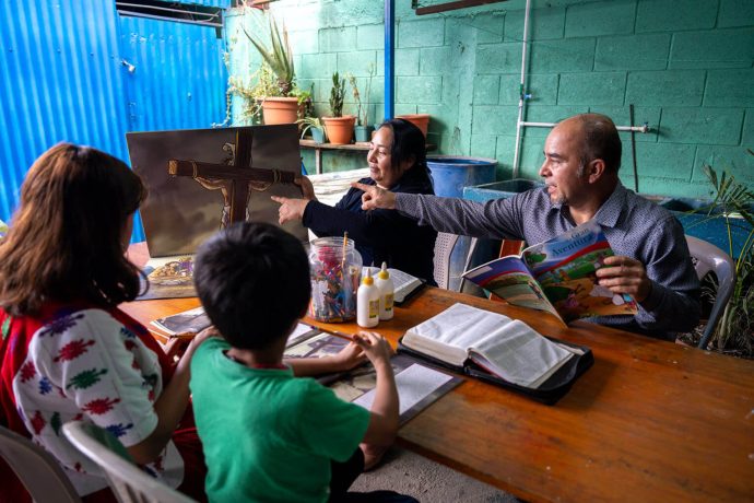Angelita and Giovany attend a discipleship class taught by the pastor and his wife