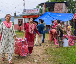 Residents received shelter supplies, water filters, solar lights, and blankets as they continue to recover after deadly flooding.