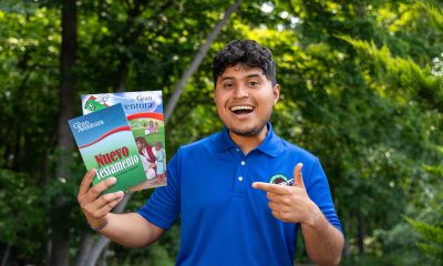 Reyel points to The Greatest Journey discipleship materials