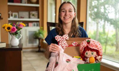 Adryana displays packed shoebox gift