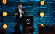 Edward Graham, Chief Operation Officer at Samaritan's Purse, speaks from the stage at the Renaissance Sea World hotel in Orlando.