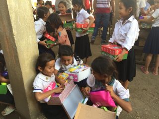 Children were delighted to receive beautiful gifts in their shoeboxes. 